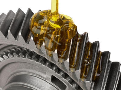 Oil being applied to a steel cog